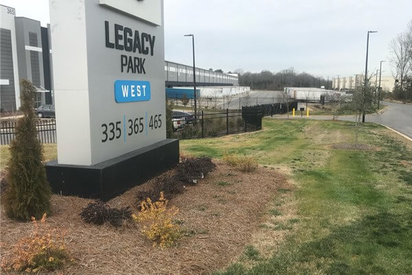 Office park entrance landscaping maintained by SouthernEEZ